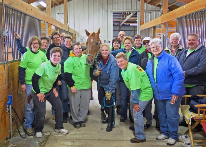Shown are in back (l-r) Caroline Stites, Marie Murray, Cindy Holt, Rich Rattell, Wilma Walton, Kathy Brown, Eric Atkins, Valerie Johns, Marjorie Brown, Jan Tricarico, Kathy Nietch and Scott Vitale. In front are Leslie Sinclair, Donna Walton, Lucy the horse, Sandra Skidmore, Dotti Outland and Diane Mead. SUBMITTED PHOTO